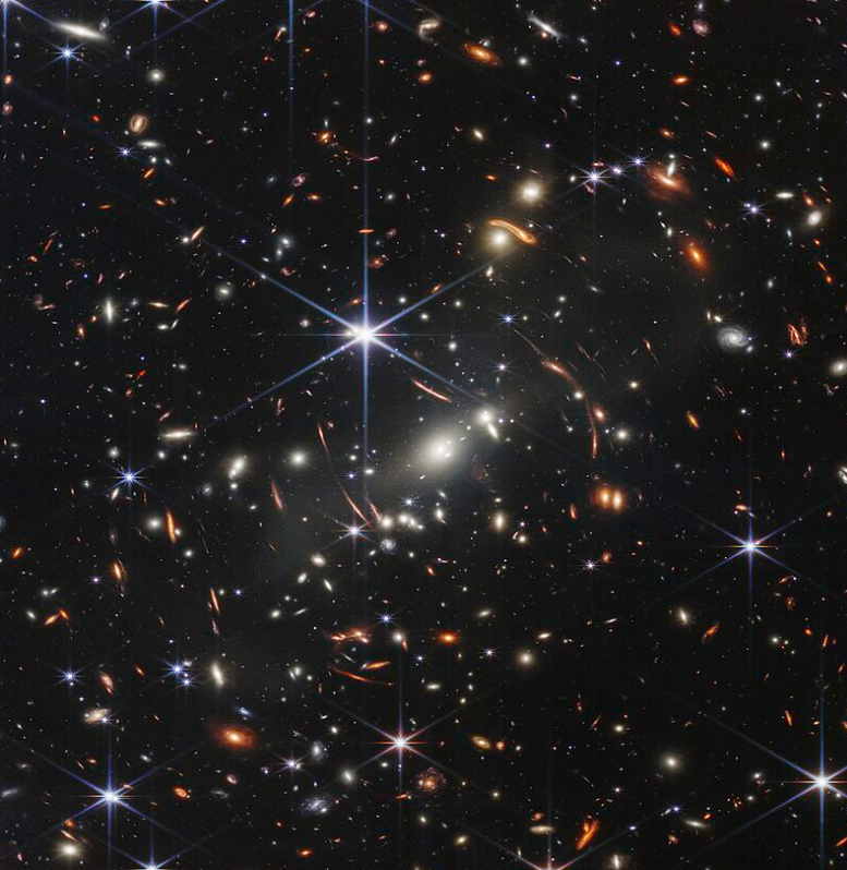 Intricate deep field view captured by the James Webb Space Telescope, revealing distant galaxies in stunning detail.