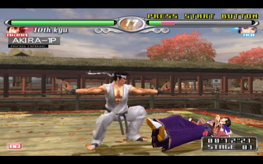 Screenshot of Virtua Fighter 4 gameplay featuring Akira and Aoi in an intense martial arts battle. Showcasing retro fighting games and the allure of playing classic titles on modern handheld devices