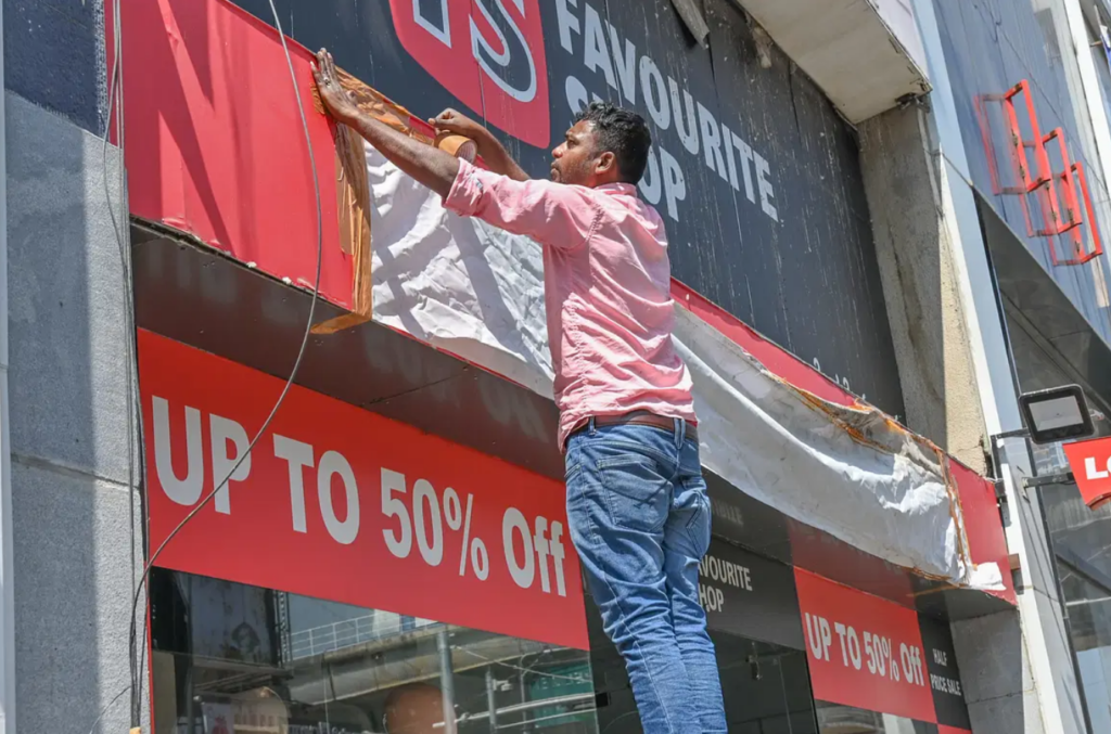 Signboard being taken down